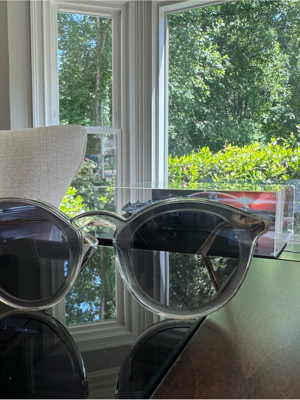 KREWE Collin’s Sunglasses with silver frame and gold accents.